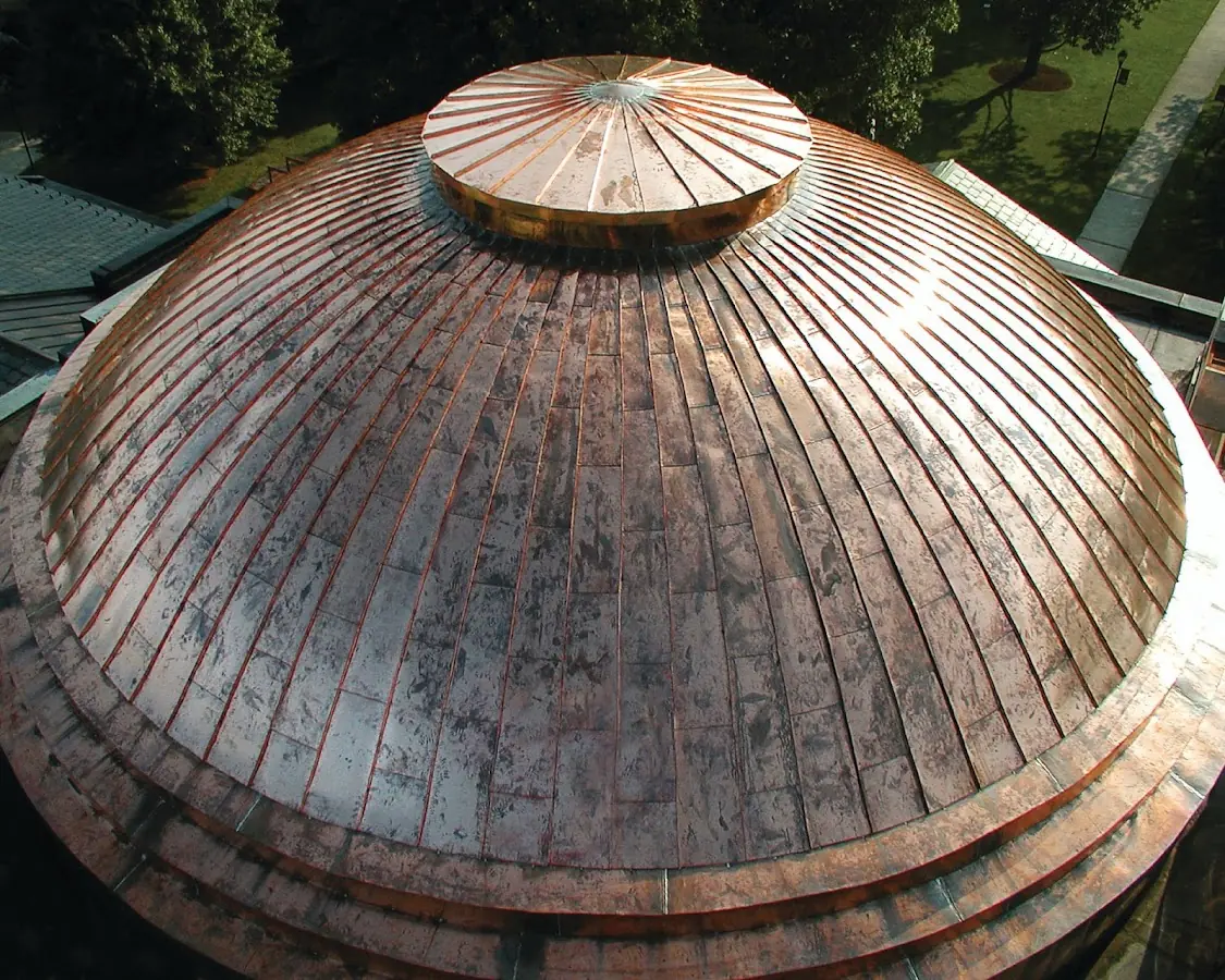 Craftsman Roofing crew installing a new roof in Carriagehouse